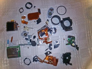Canon A60 disassembled digital camera parts